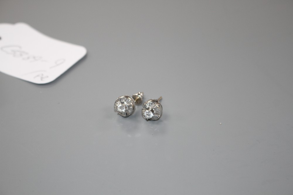 A pair of modern 18ct white gold and diamond cluster earstuds.